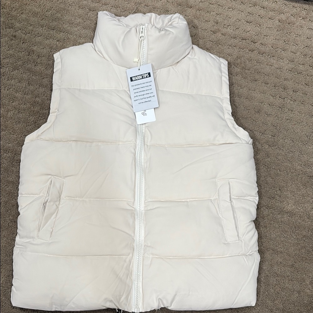 Cream Puffer Jacket with High Collar and Quilted Design